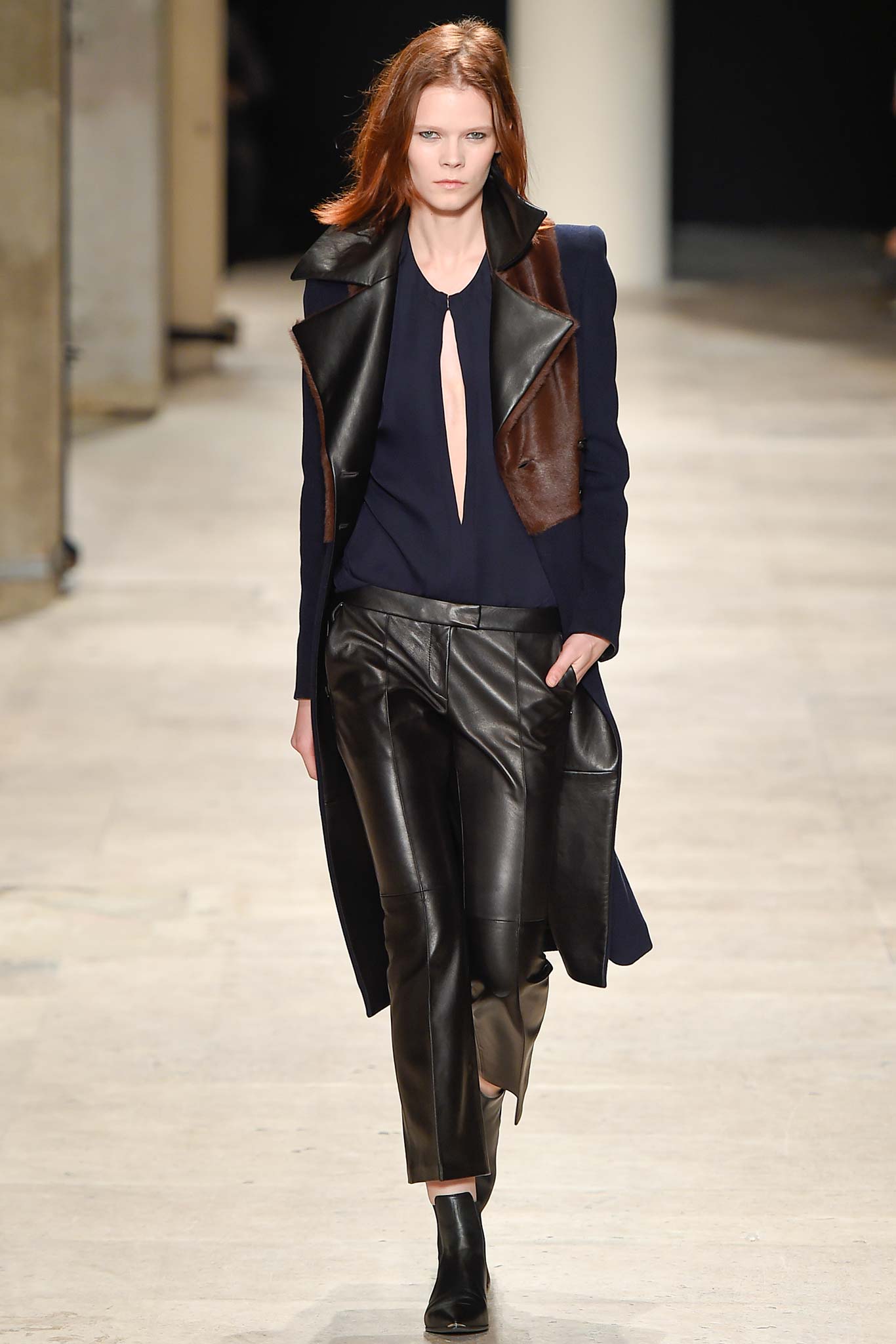 black leather long-sleeve collared fitted layered coat