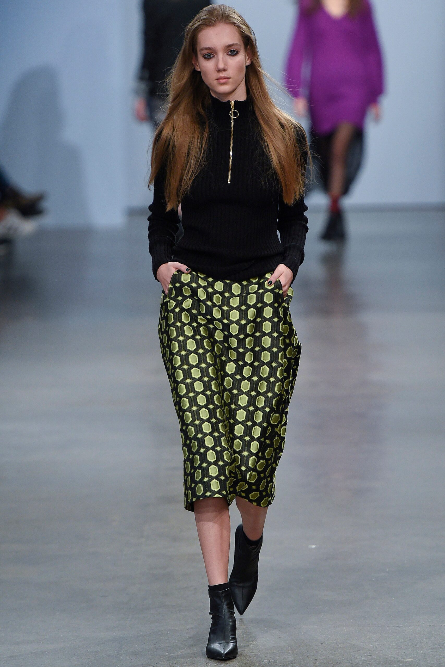 black fitted top green printed skirt