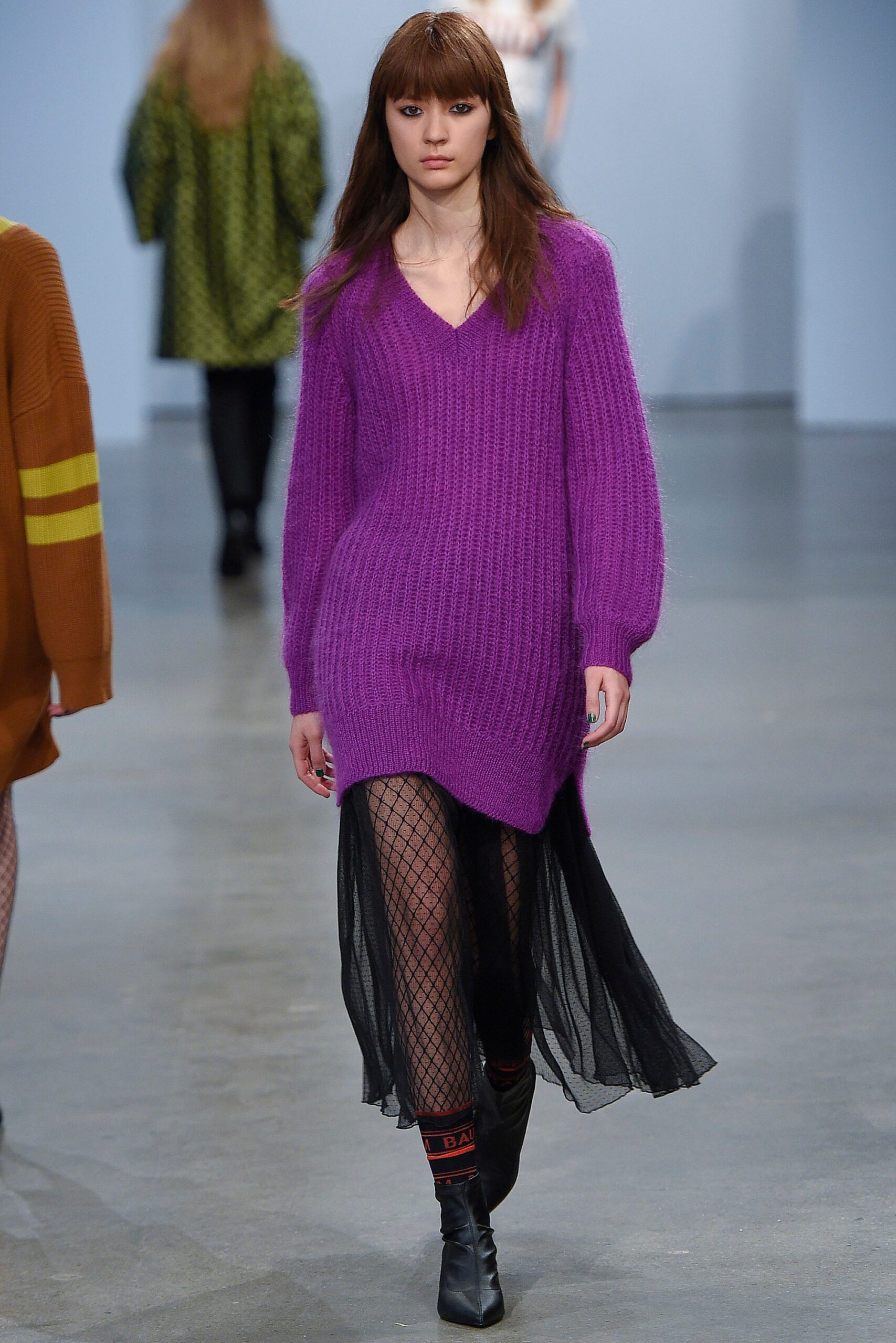 purple wool relaxed sweater with black midi skirt