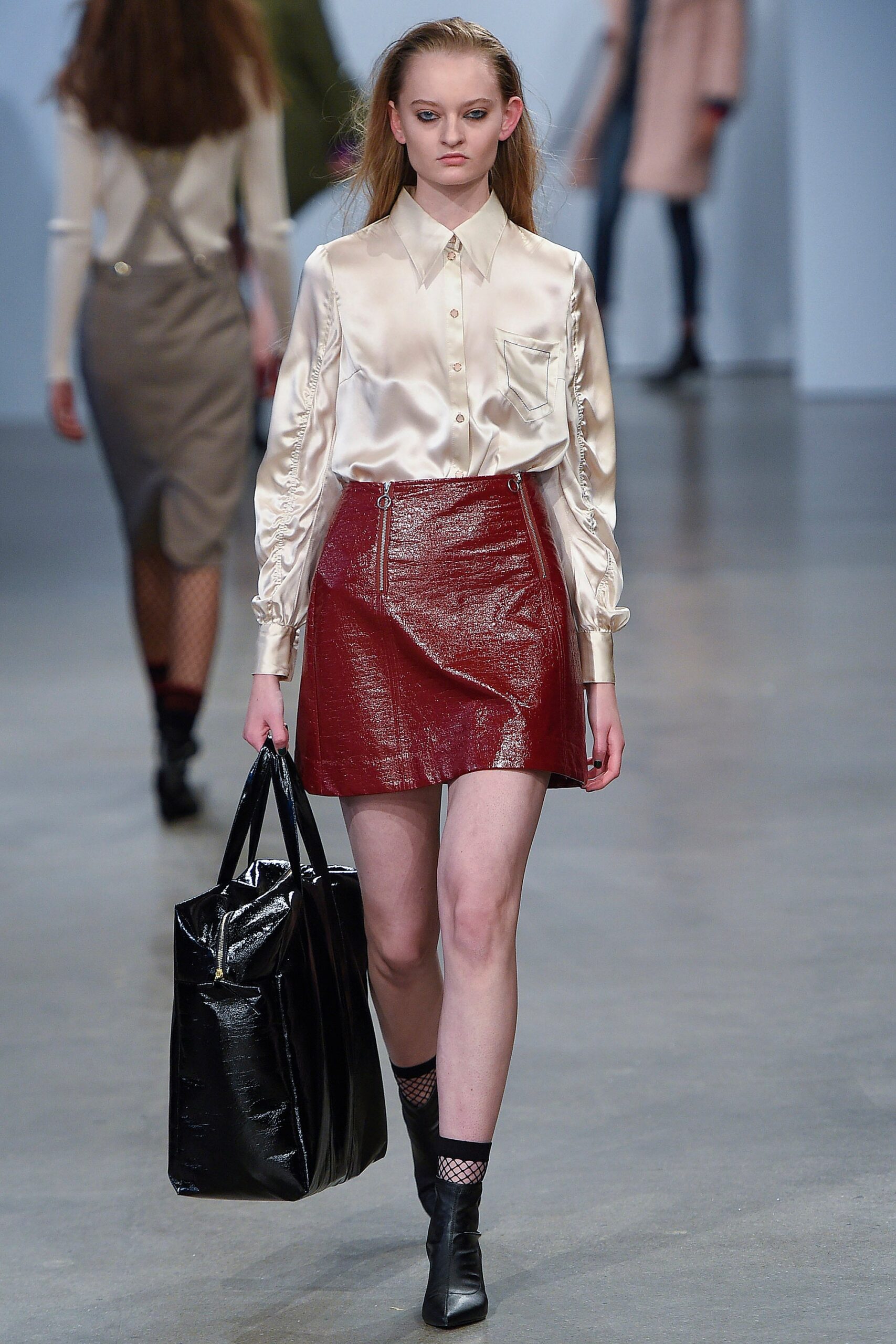 white silk shirt and red leather skirt