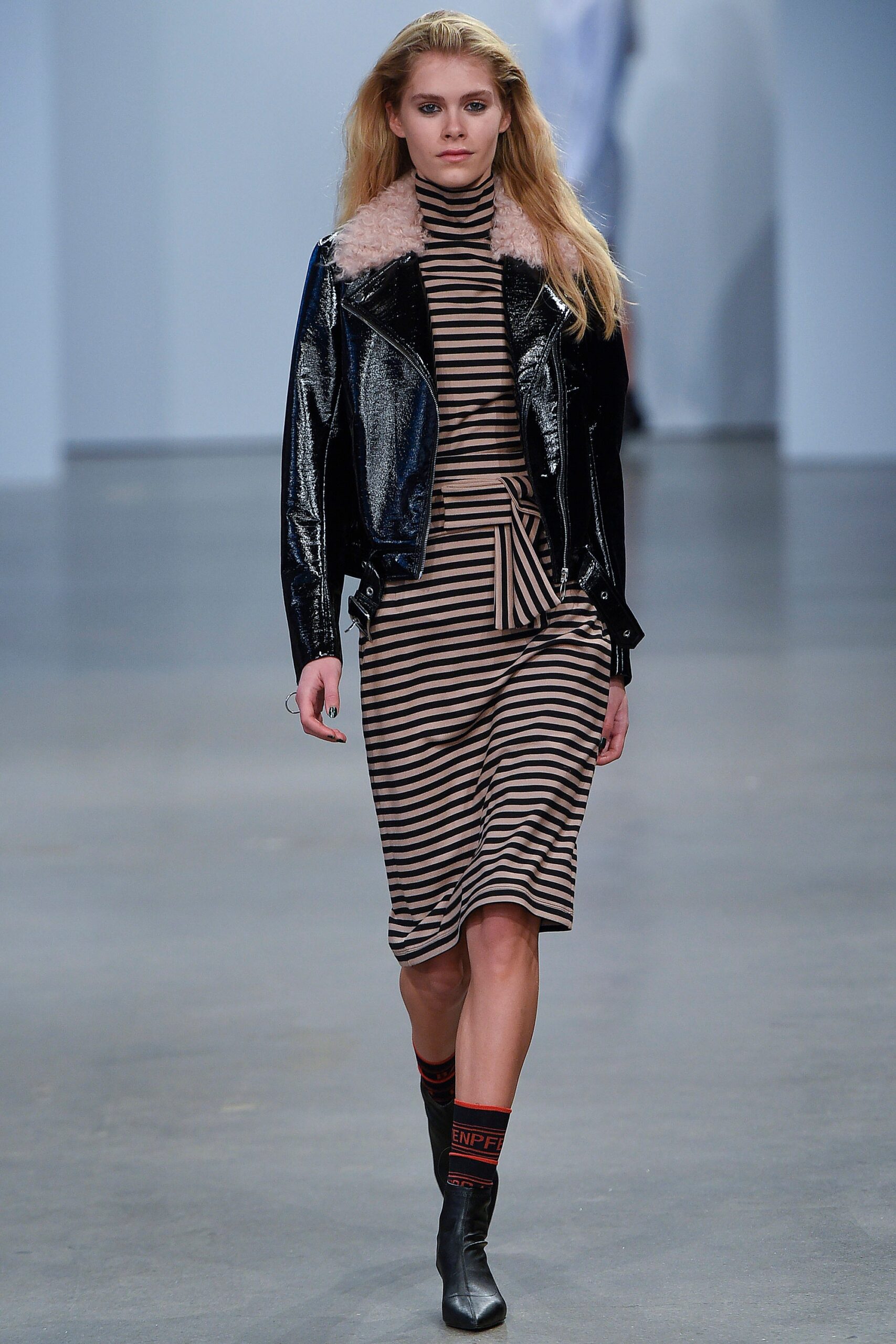 black vinyl jacket with striped dress