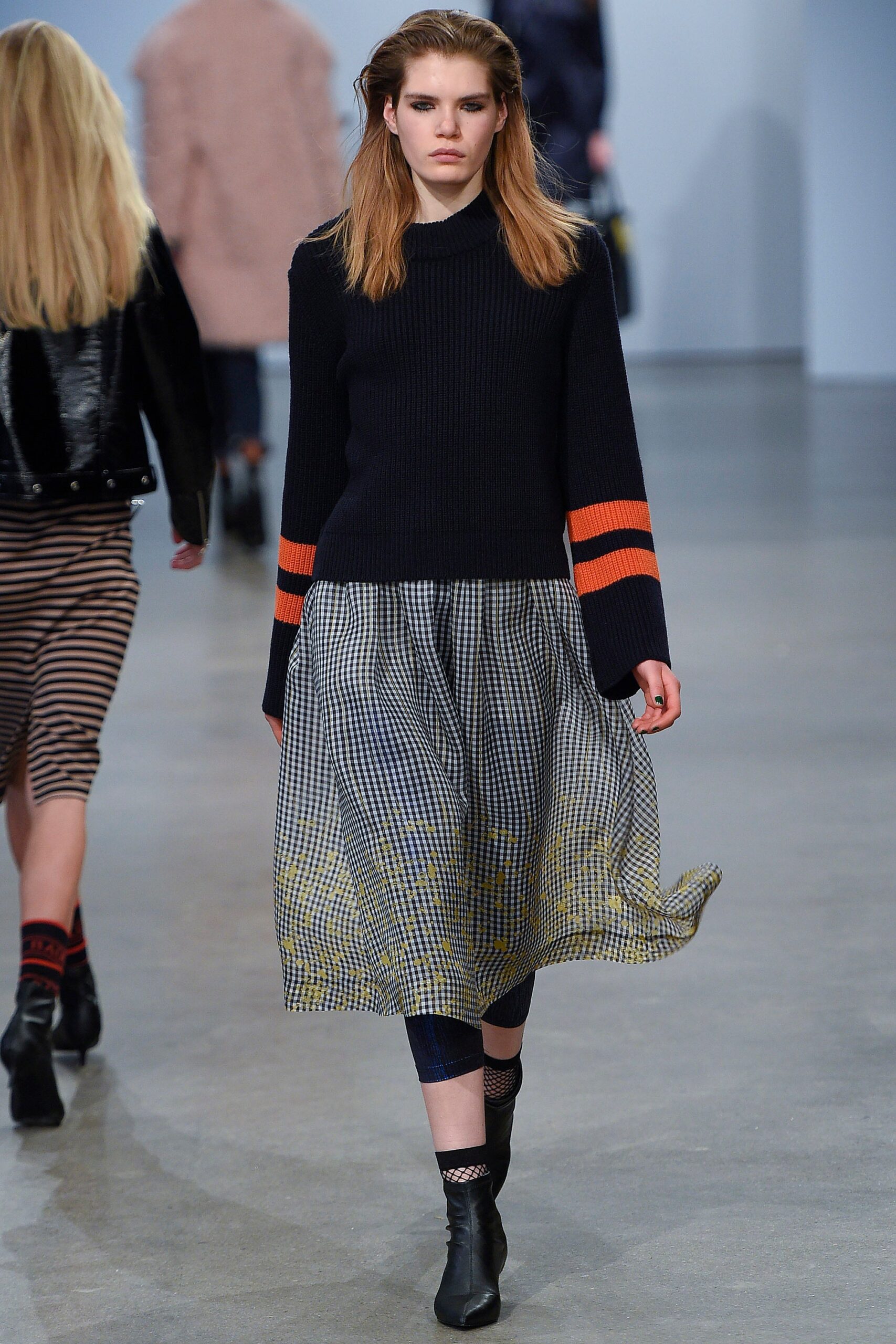 navy sweater with pleated skirt