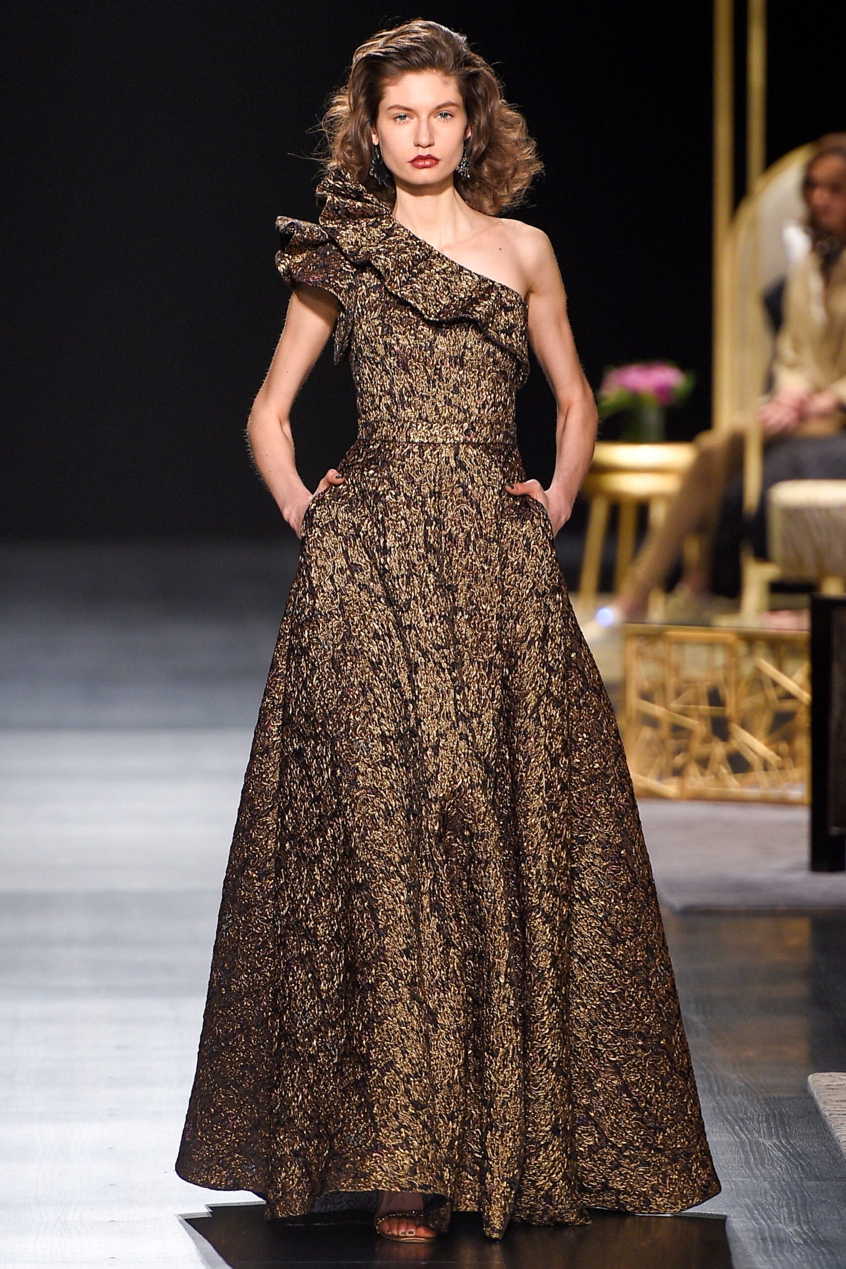 gold and black asymmetric gown
