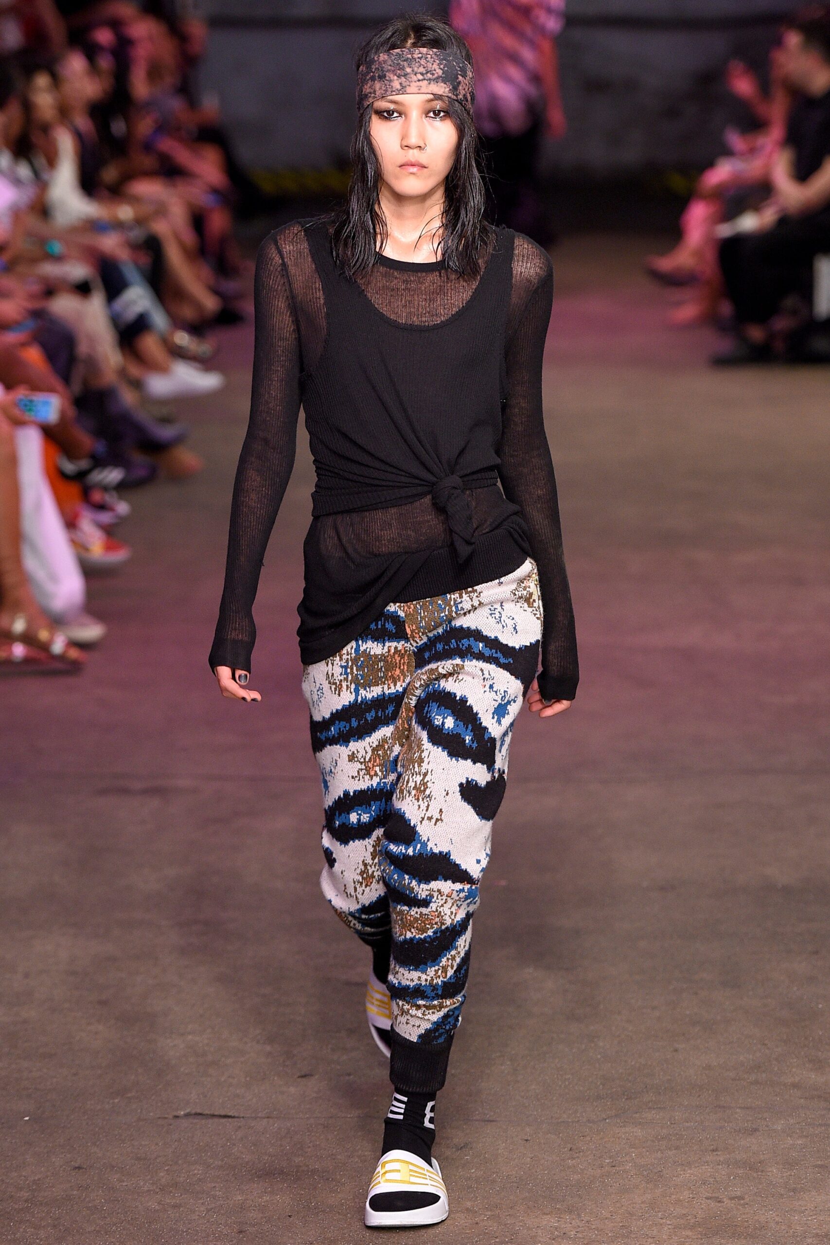 black fitted top with multi pants