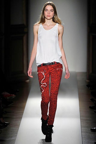 white relaxed top with red pants