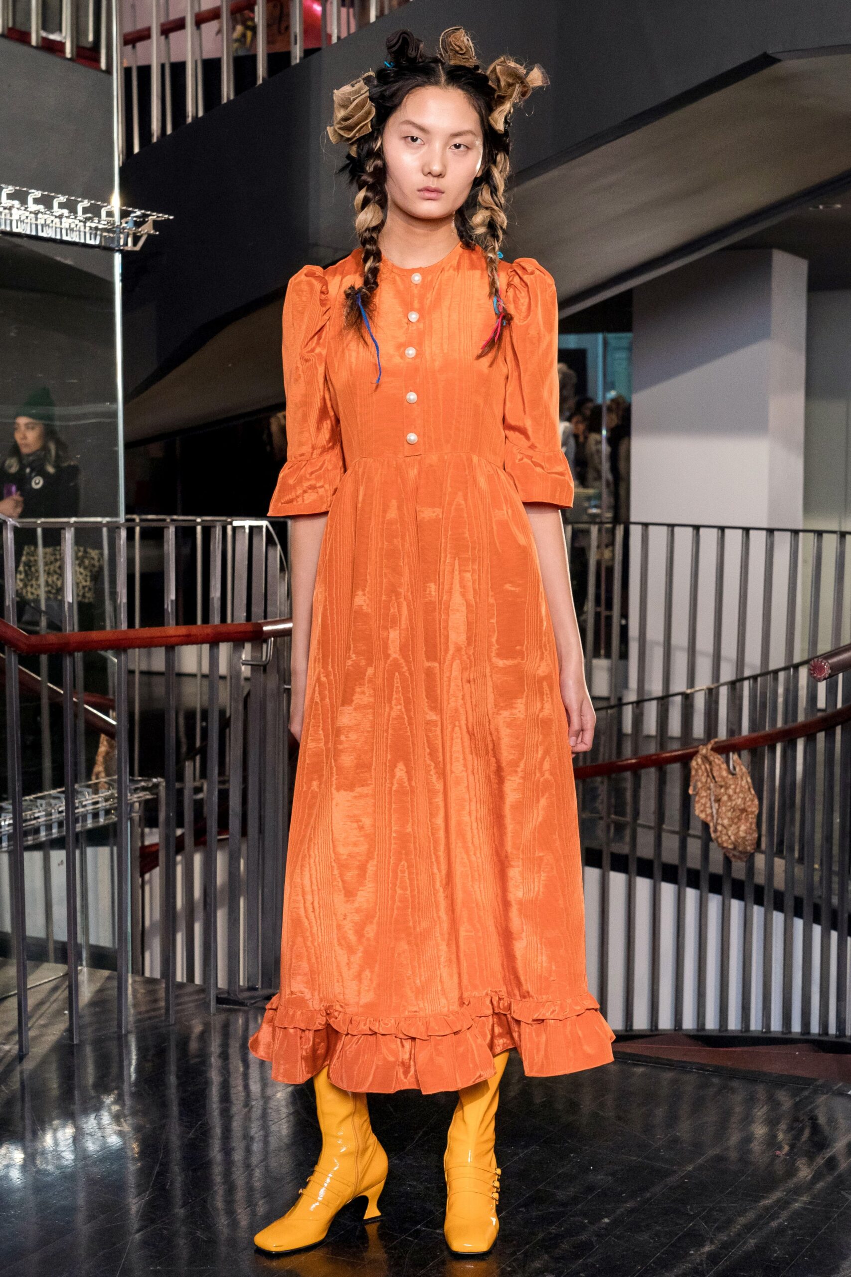 orange midi dress with yellow boots
