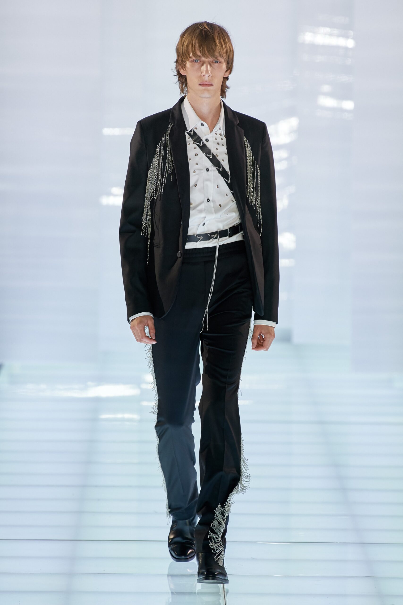 black fitted suit with fringes