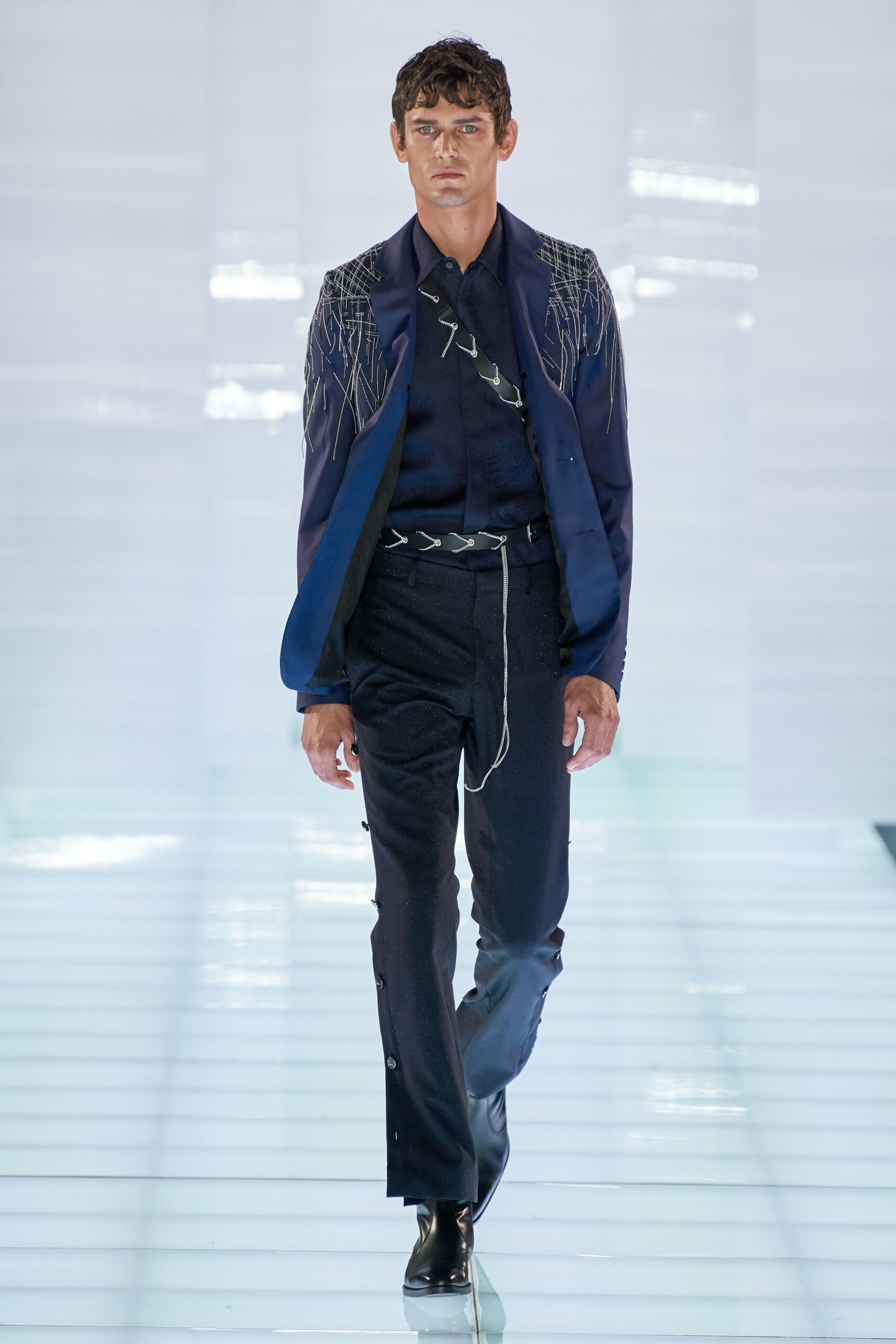 blue tailored blazer with black shirt