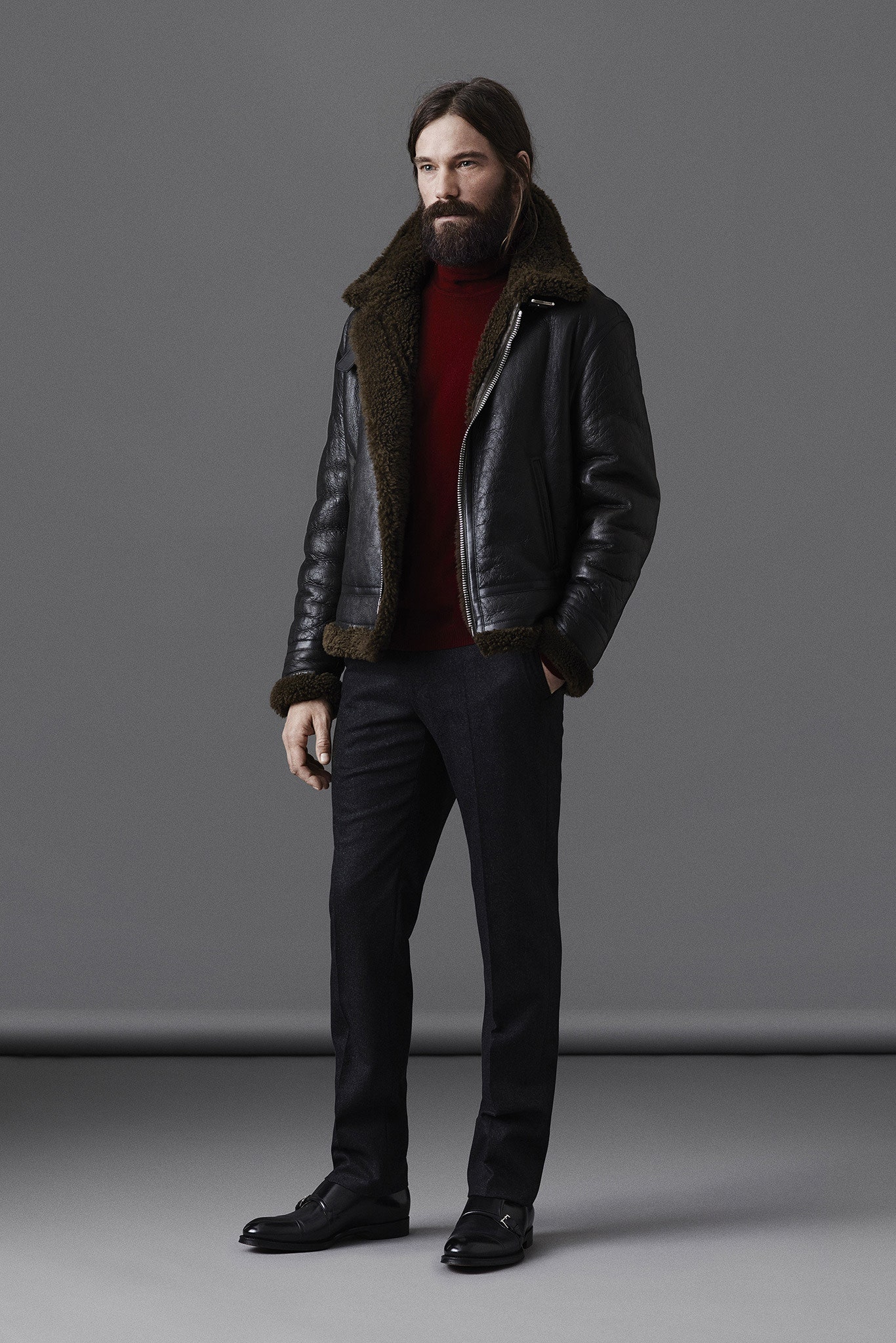 black leather jacket with red turtleneck