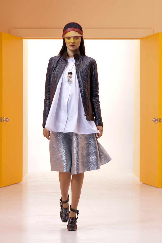 black leather jacket white shirt silver skirt