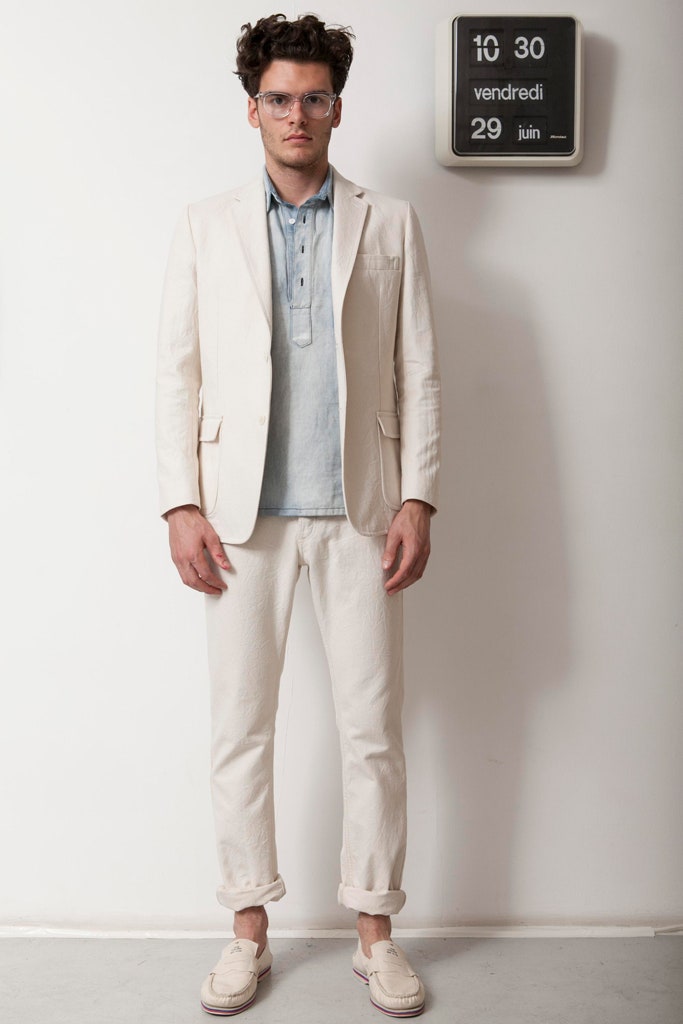 white tailored suit with blue shirt