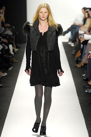 black mini dress with faux-fur jacket