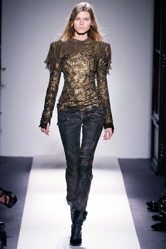 gold sequined fitted top with distressed pants