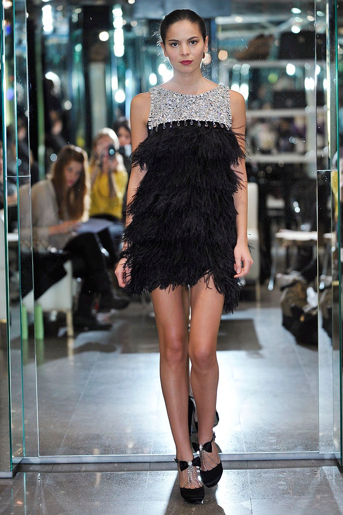 black fringed sleeveless dress