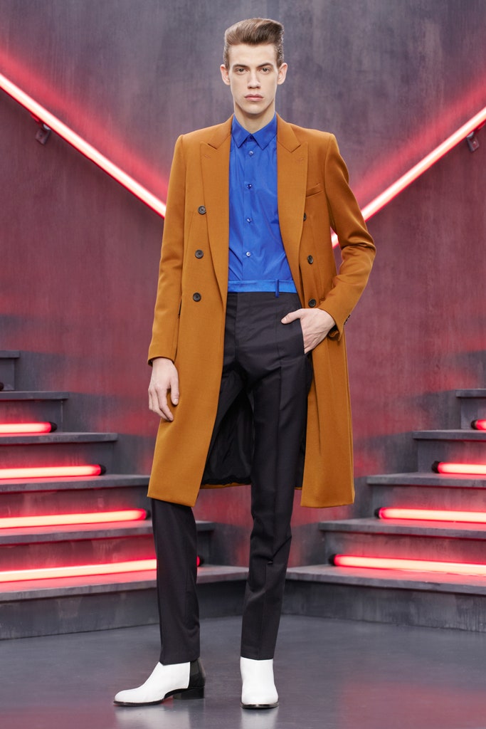 orange tailored coat with blue shirt