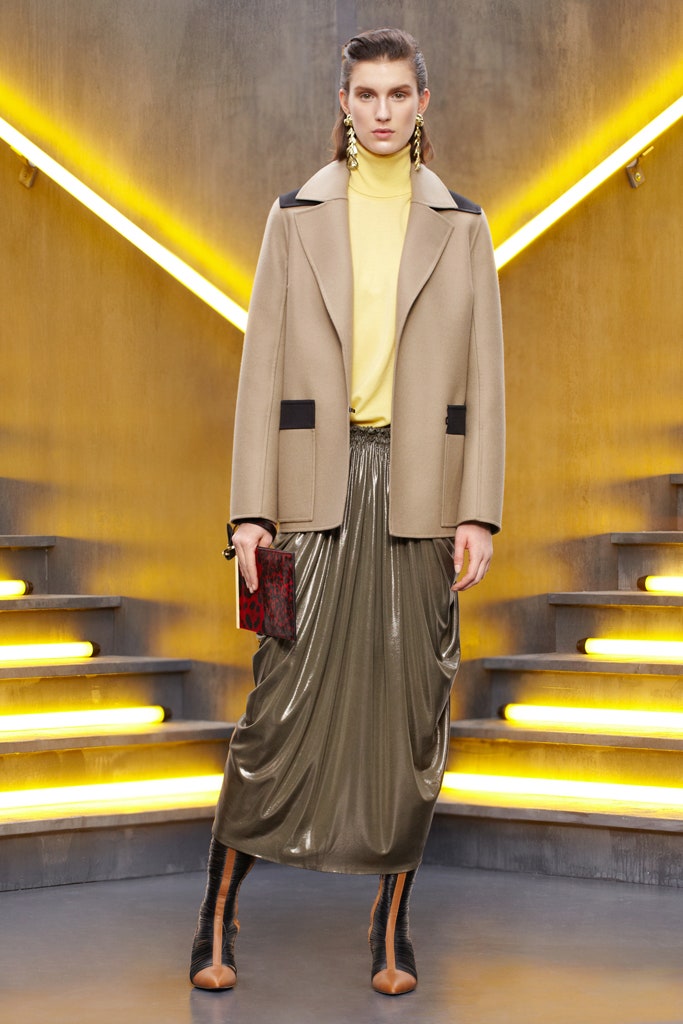 beige jacket yellow top olive skirt