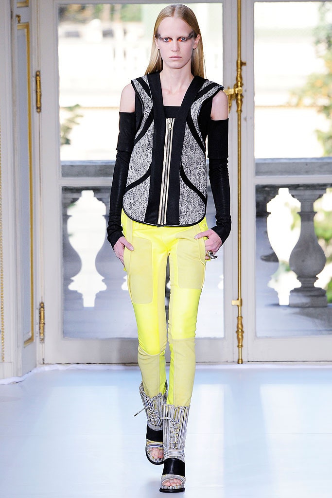 black and white fitted top with yellow pants
