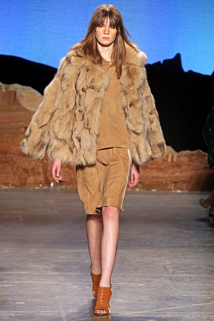 brown fur coat with beige skirt