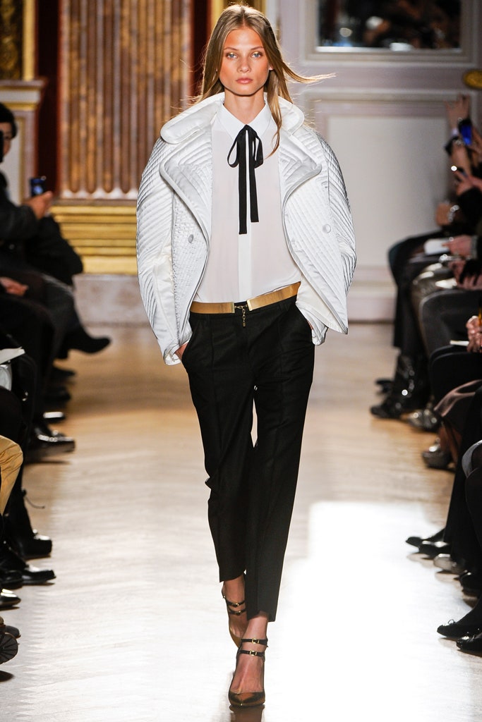 white quilted jacket with black pants