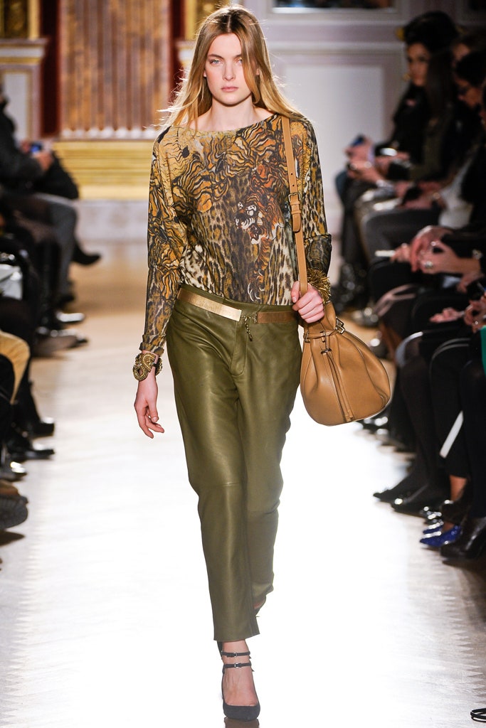 brown printed silk top with green leather pants