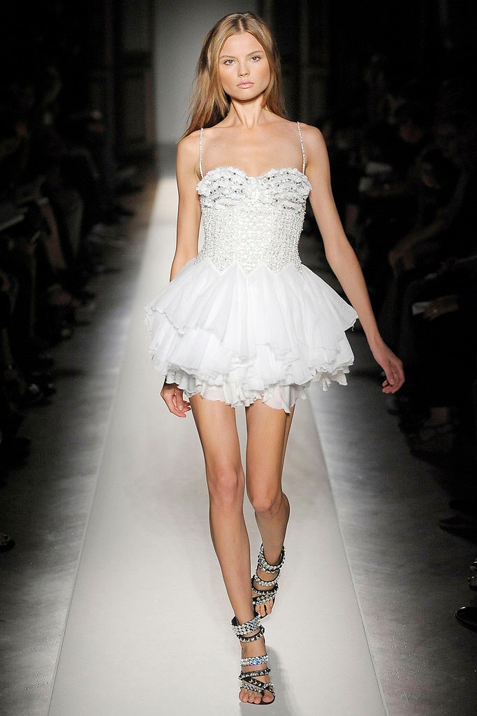 white ruffled strapless mini dress