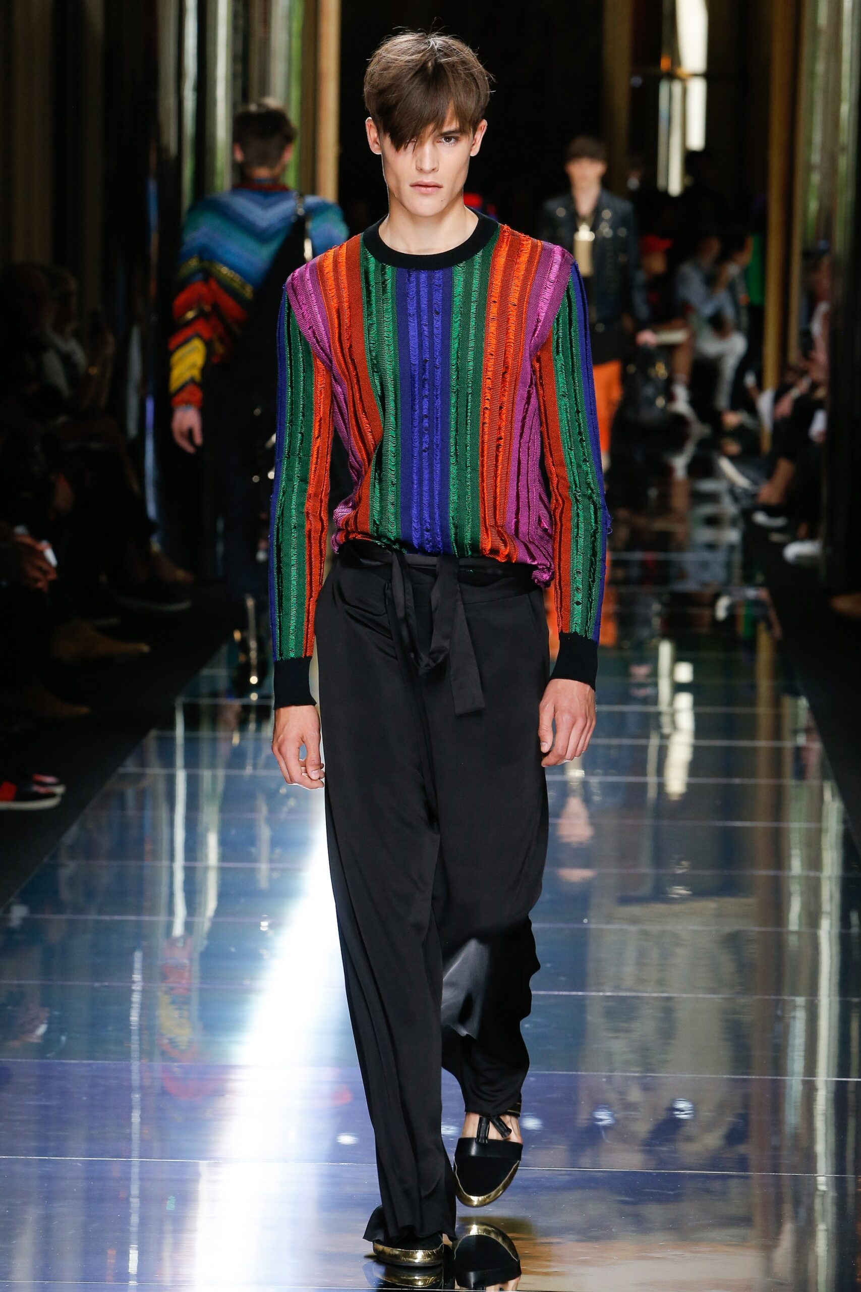 multi-colored fitted sweater with black pants