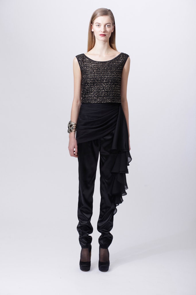 black and gold embellished top with draped pants