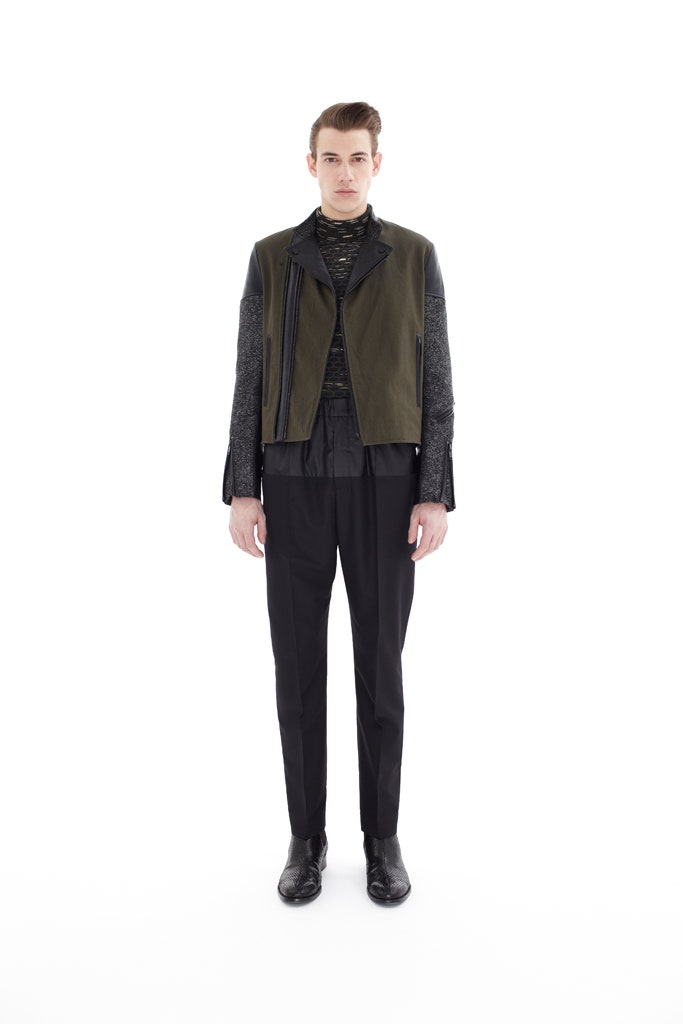 green fitted jacket with black shirt