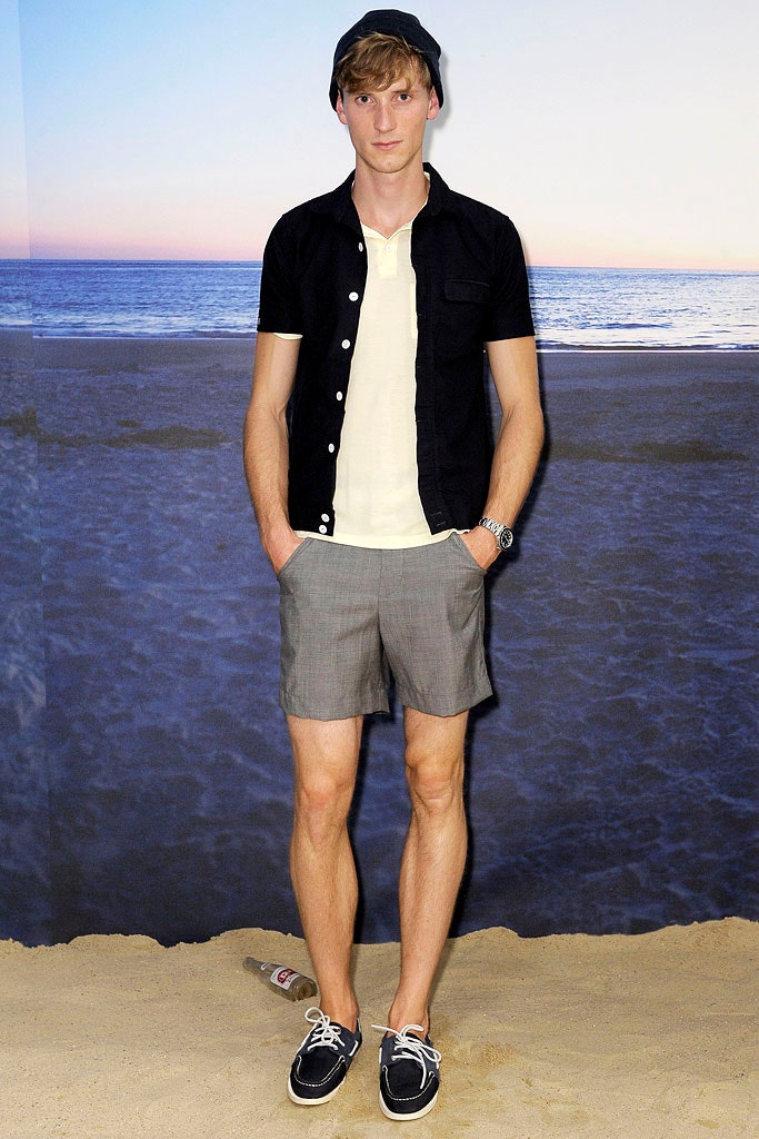 black shirt white t-shirt gray shorts