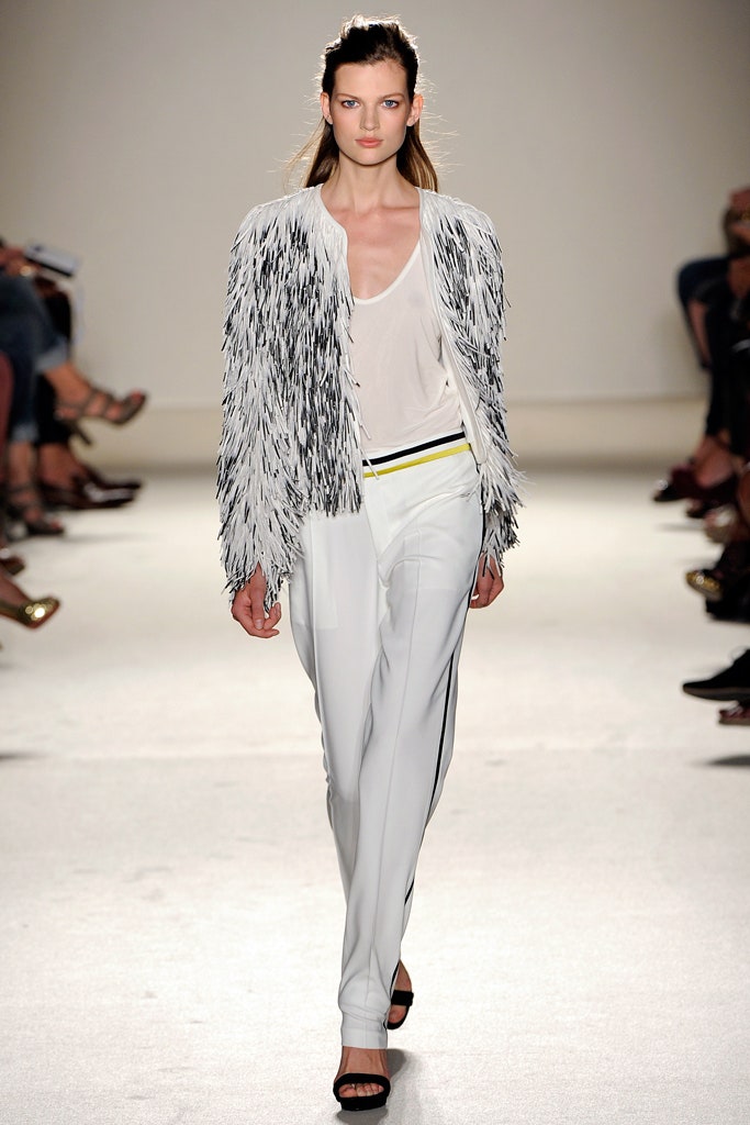 white fringed jacket with tailored pants