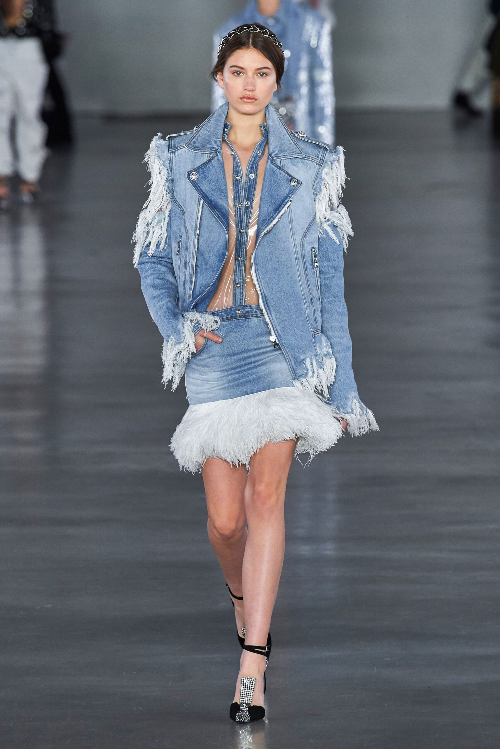 blue denim jacket with fringed details