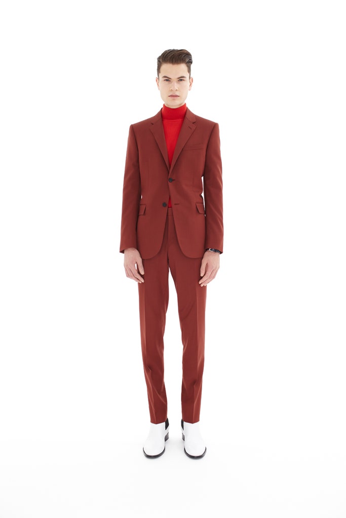 red tailored suit with turtleneck