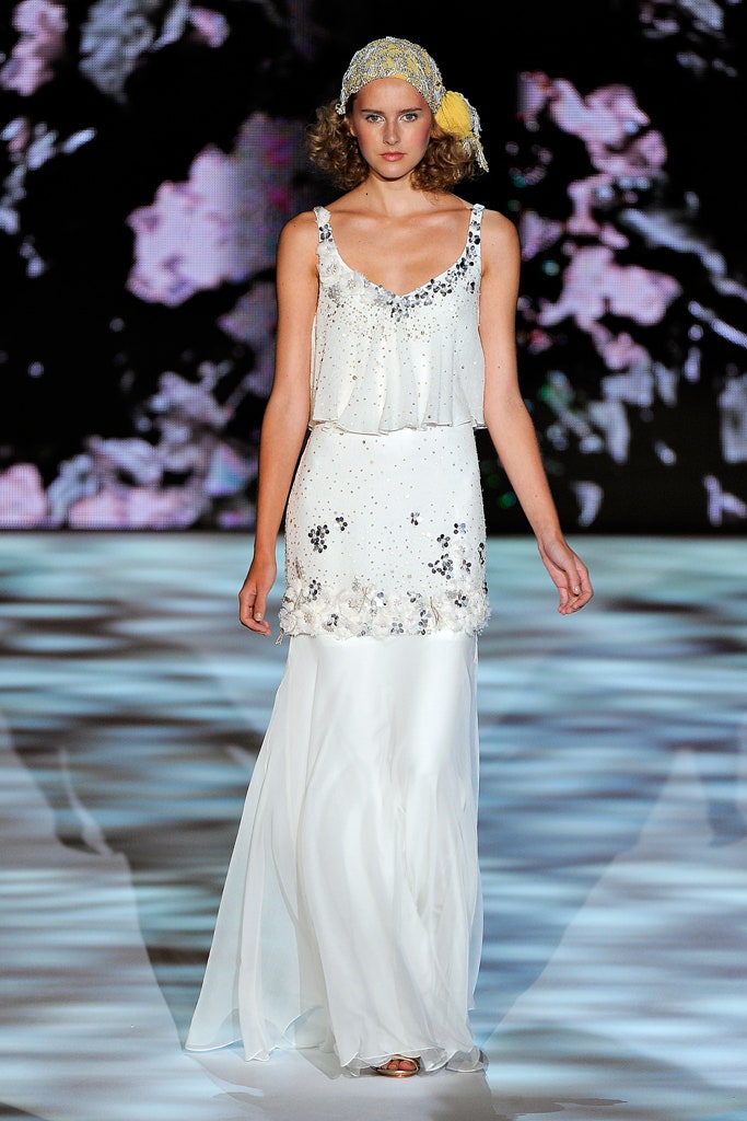 white embellished sleeveless gown