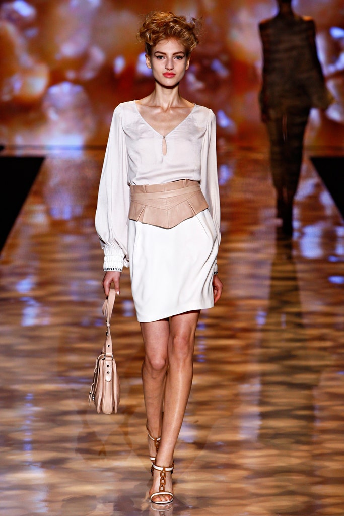 white silk blouse with beige skirt