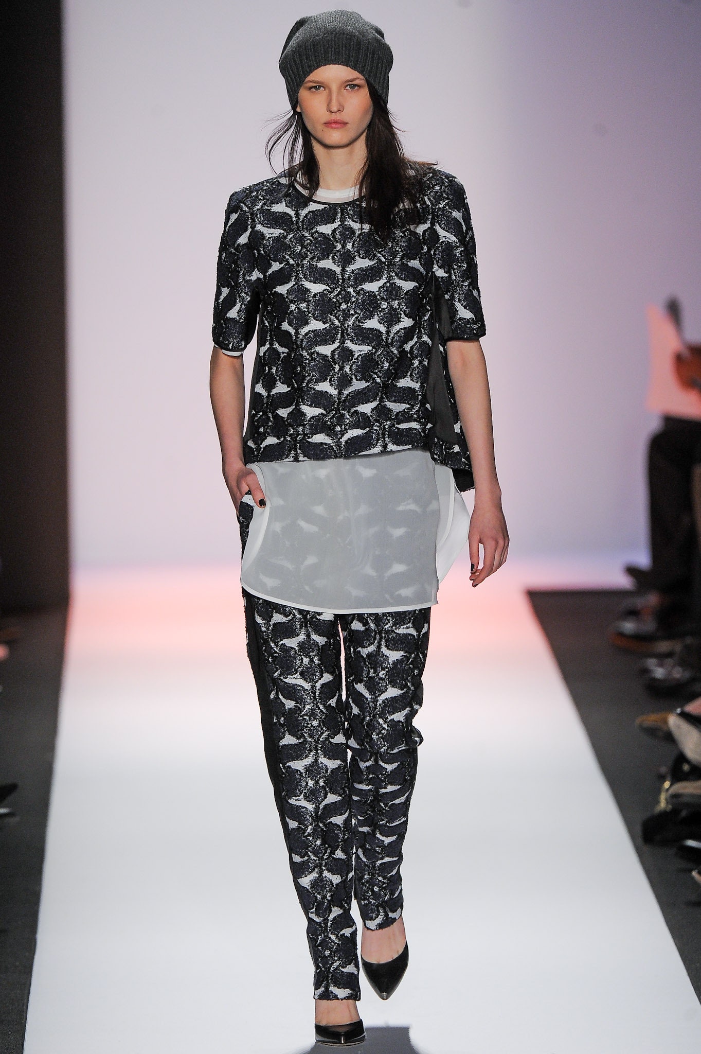 black and white embroidered top with fitted pants