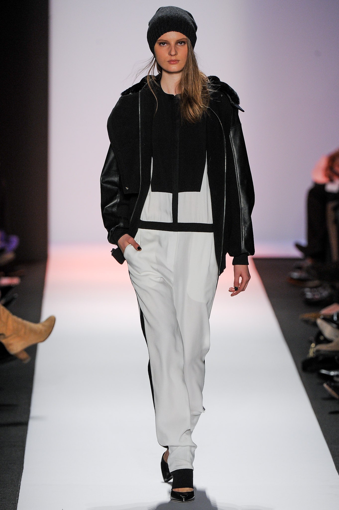 black leather jacket with white pants