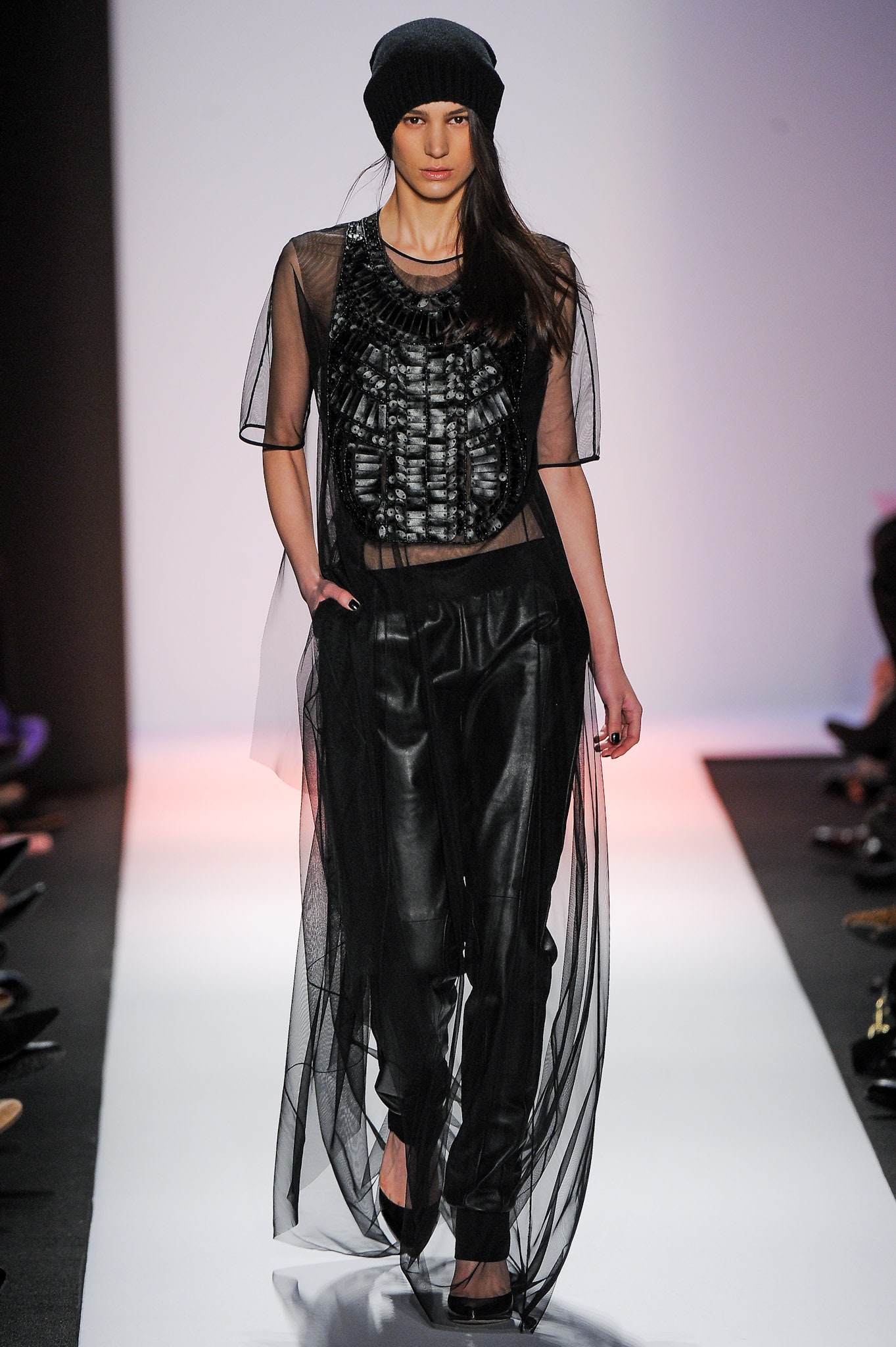 black mesh top and leather pants