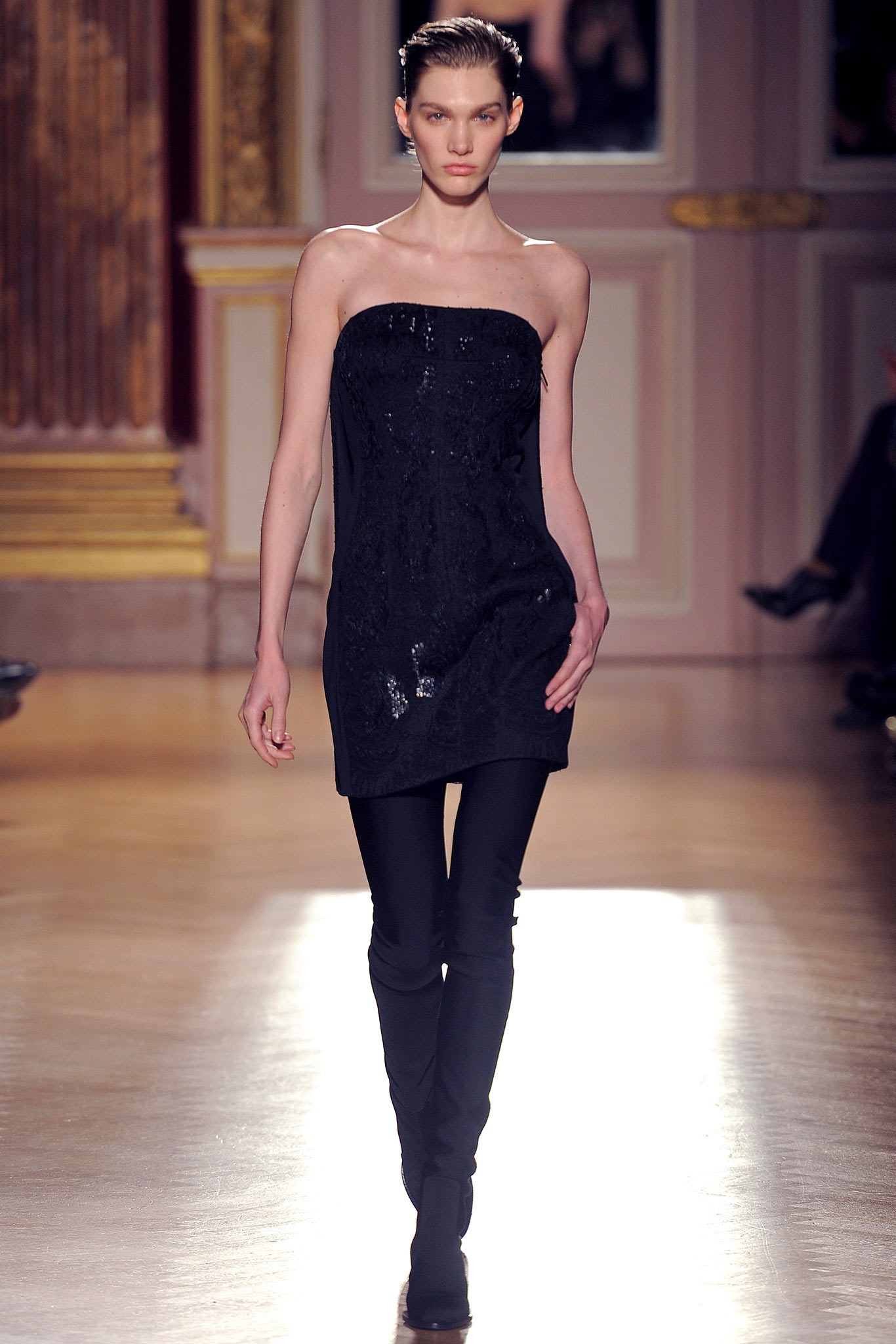 black strapless sequined dress with fitted pants