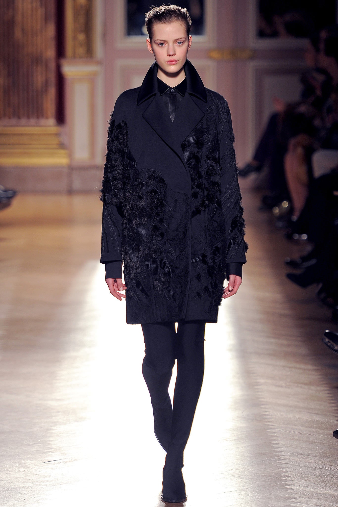 oversized black coat with embroidered details