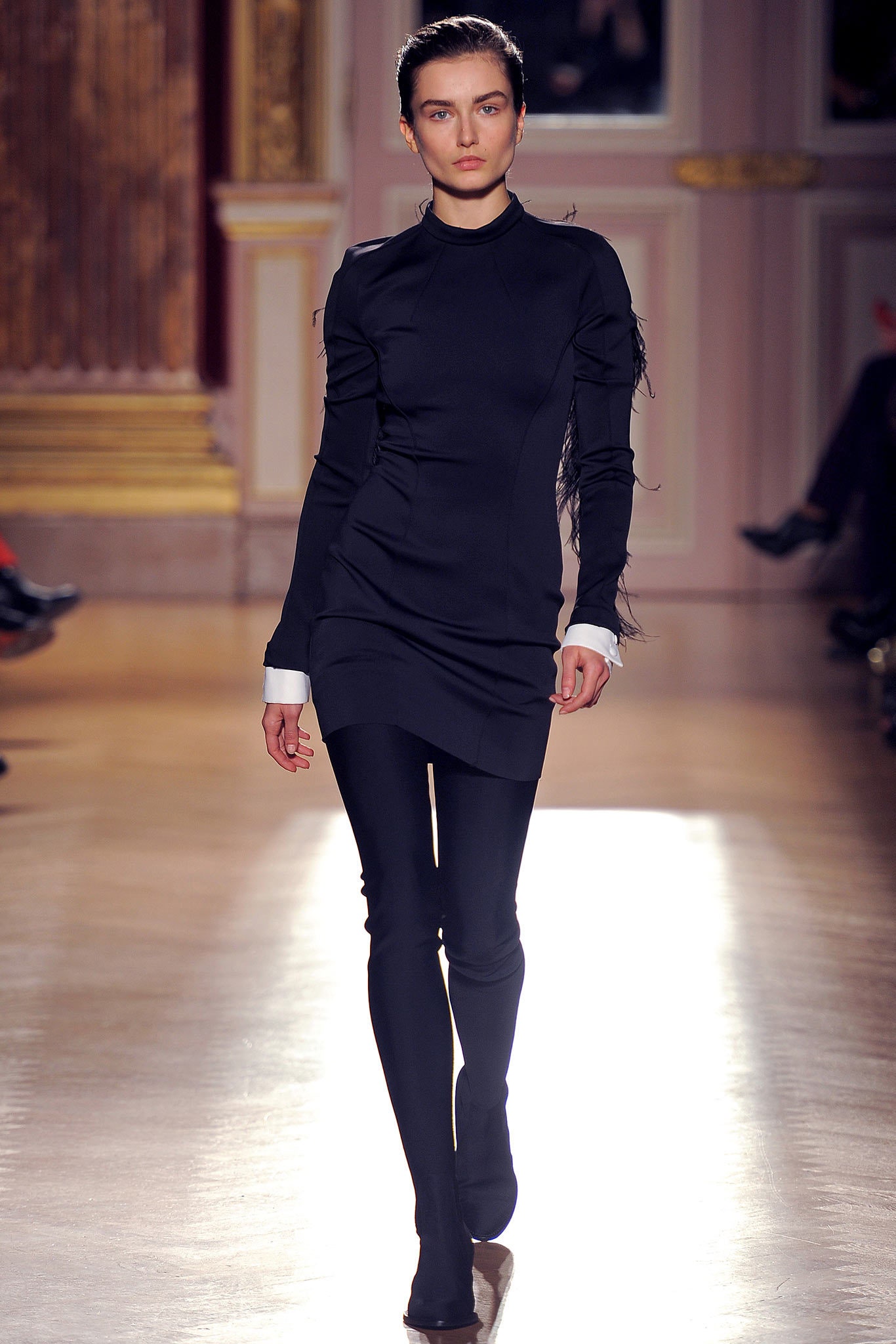 black fitted dress with fringes