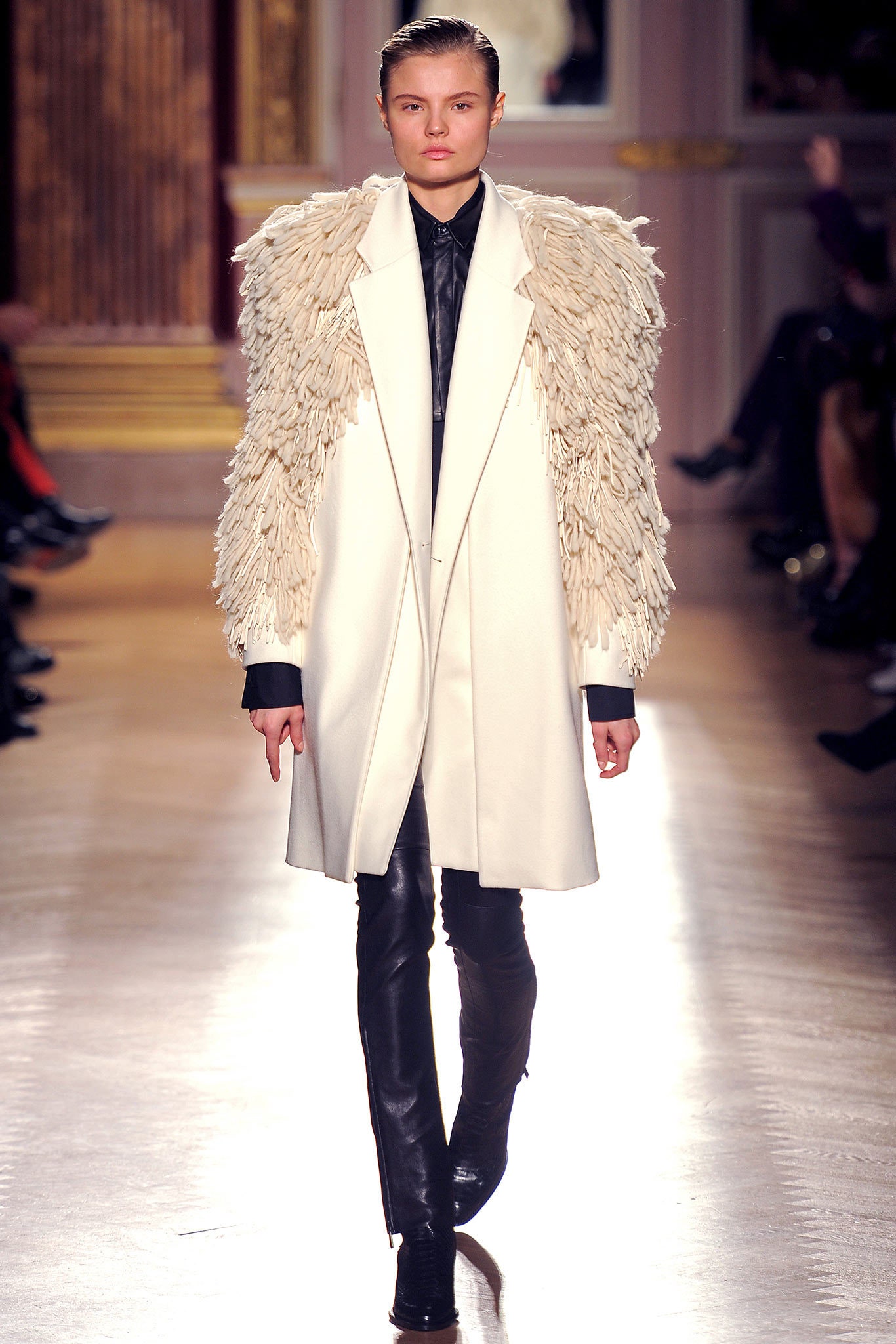white wool coat with black leather pants