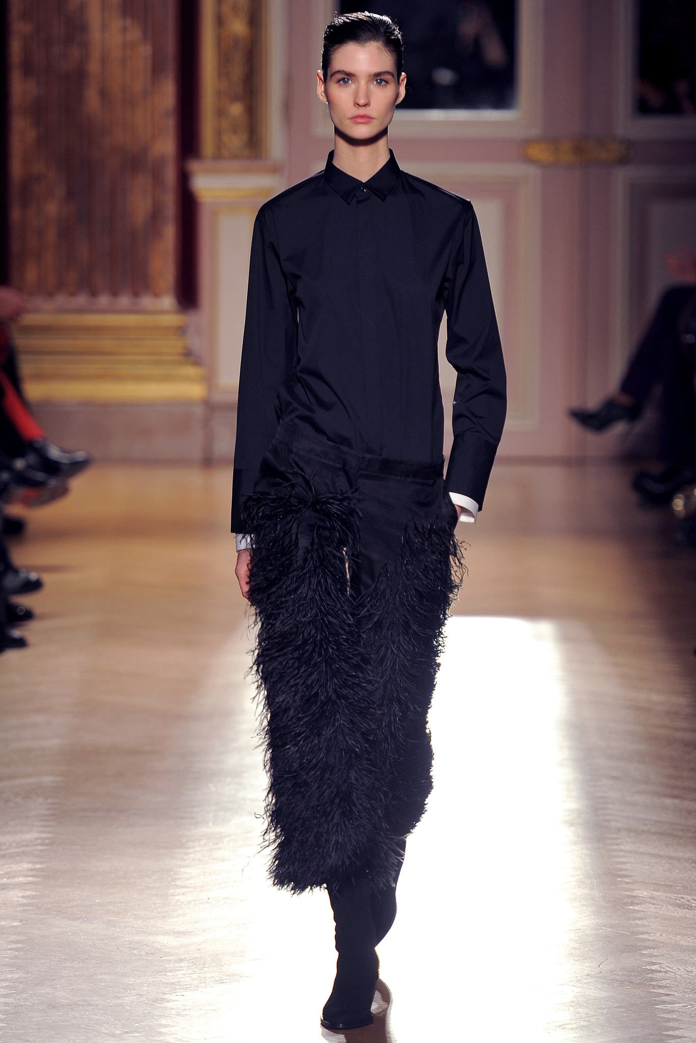 black fitted shirt and fringed skirt