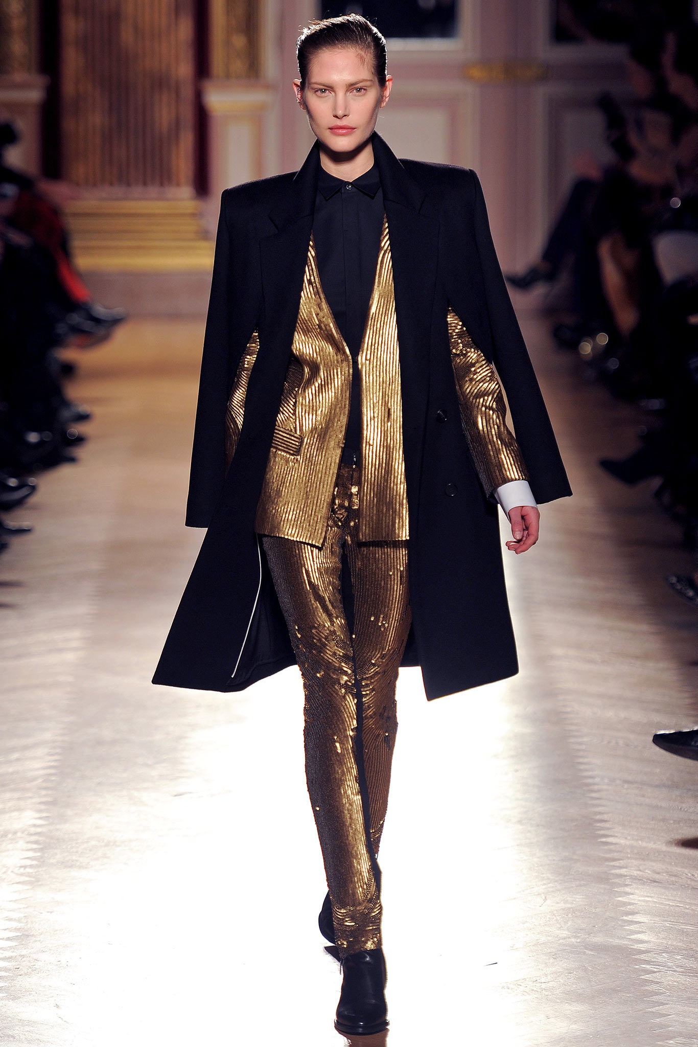 black wool tailored coat and gold suit
