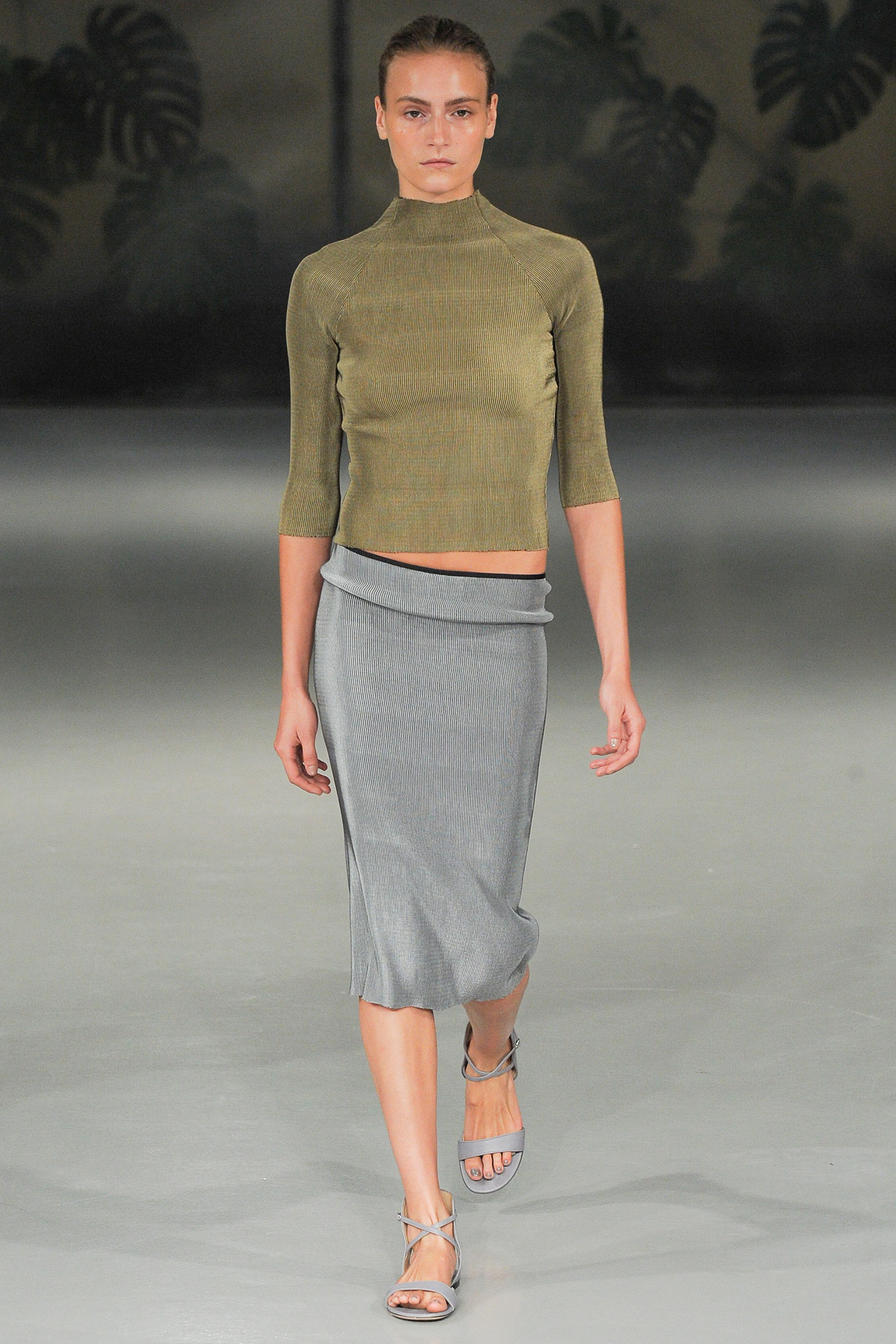 green fitted cropped top and gray midi skirt