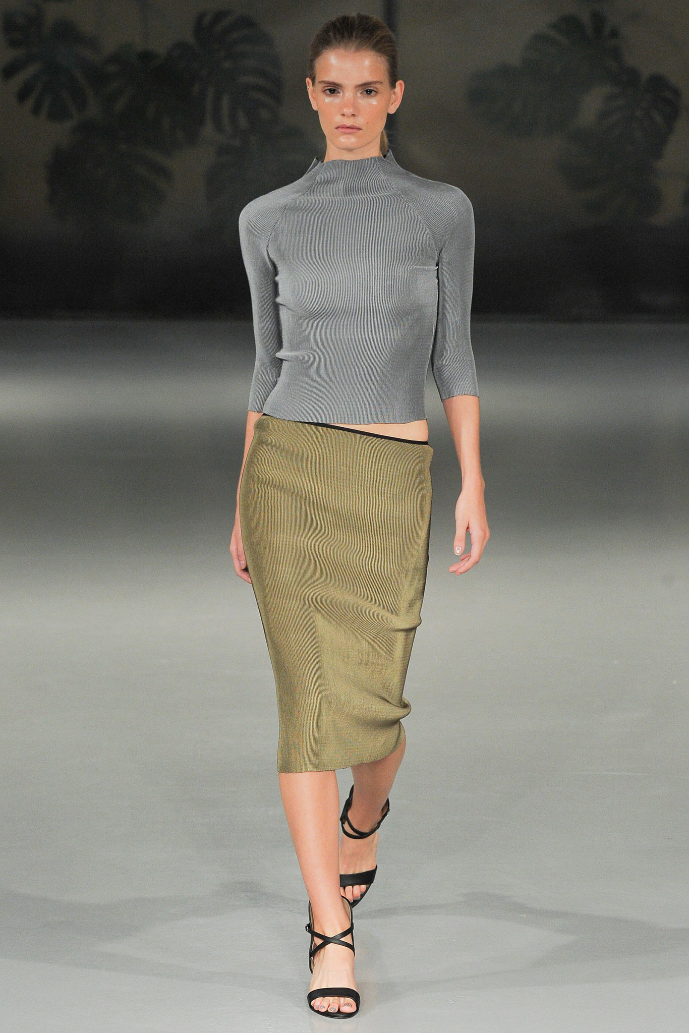 gray fitted top and green midi skirt