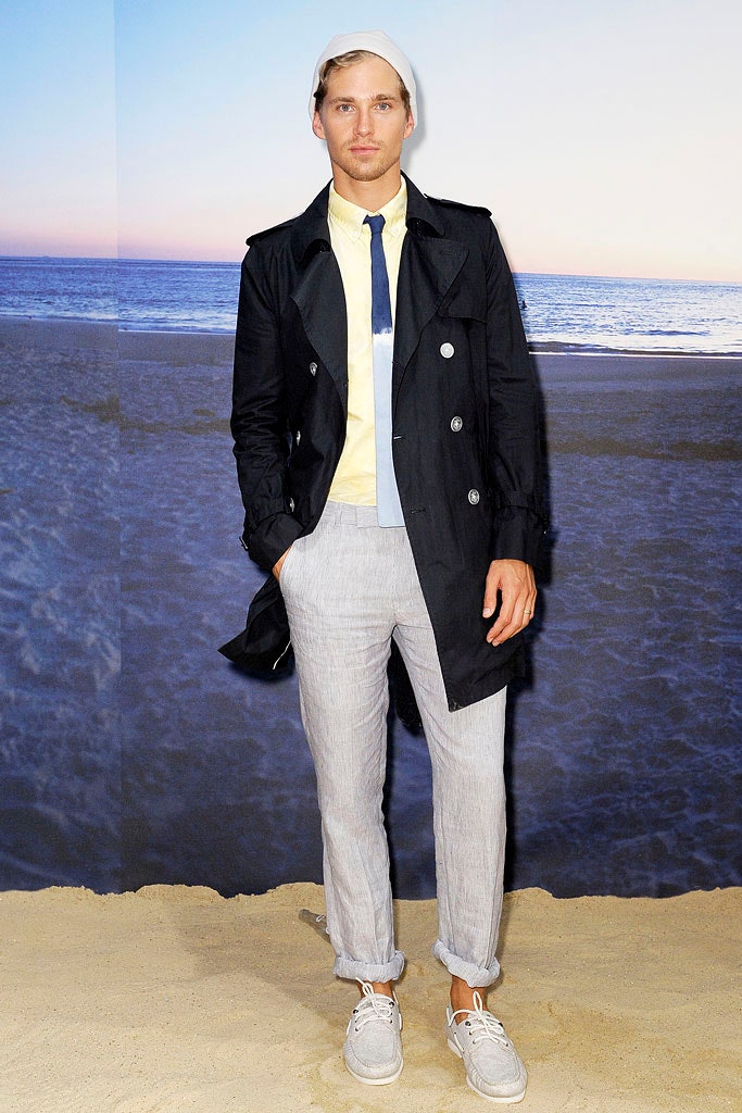black trench coat with yellow shirt