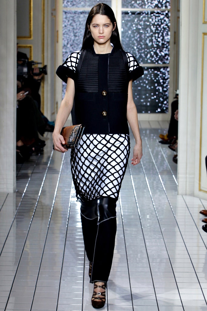 black and white fitted dress with leather pants