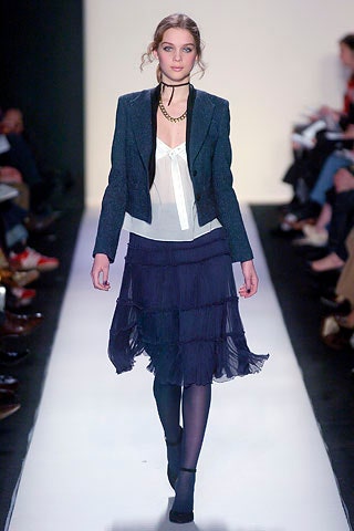 tailored blazer with pleated blouse