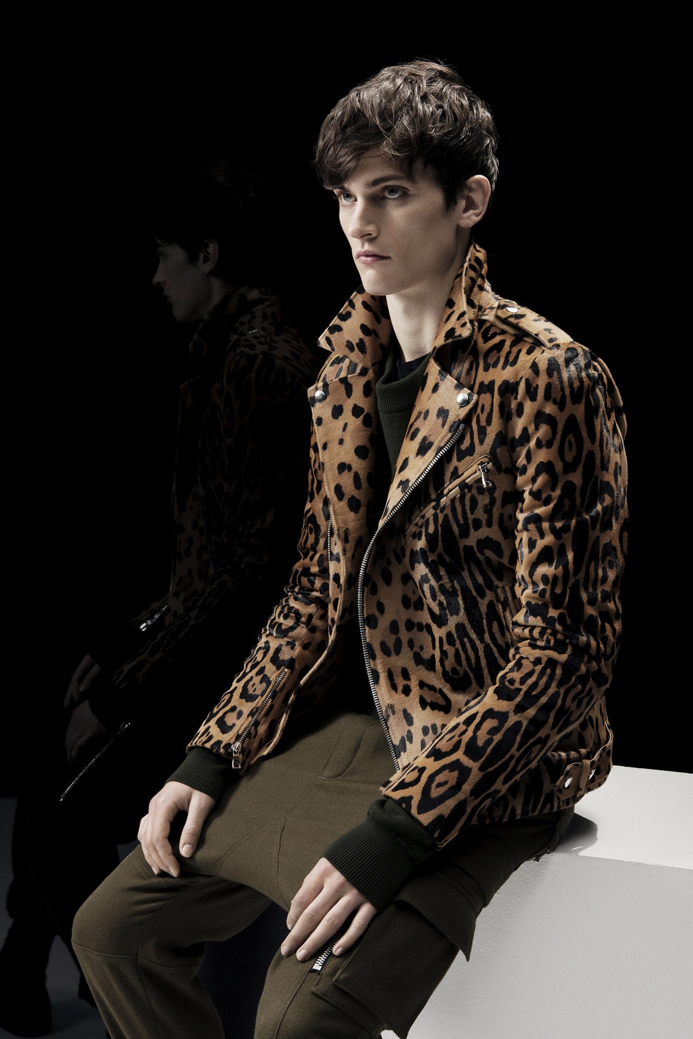 brown animal-print leather jacket and green pants