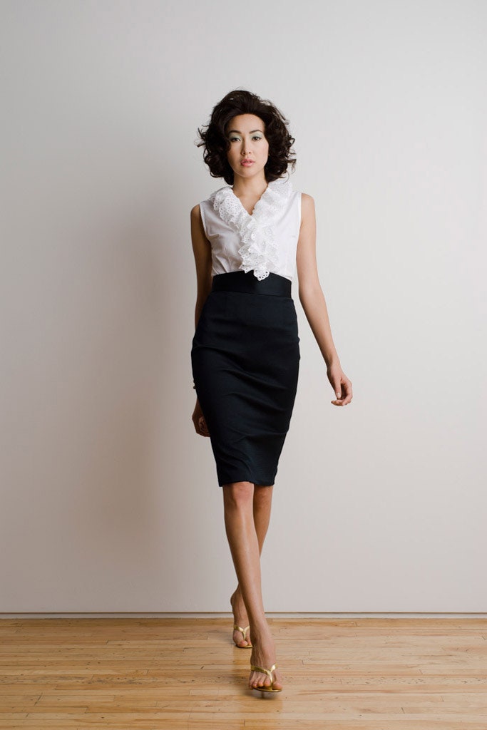 white ruffled blouse and black pencil skirt